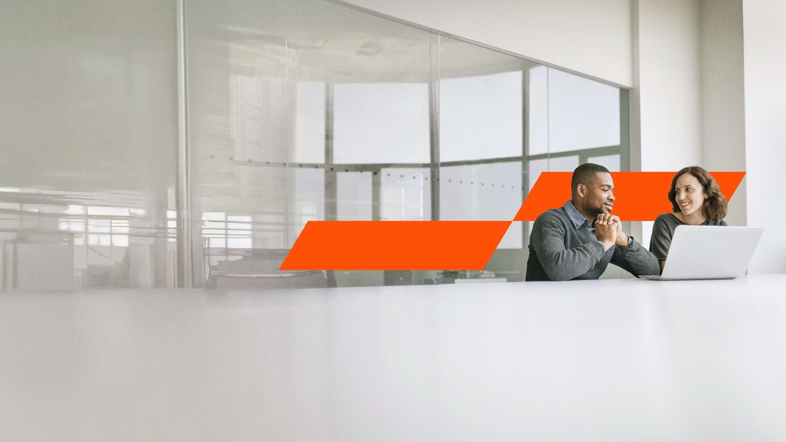 Men and woman in an office